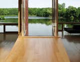 "Water visually fills the void between the two modules," says Garrison, who designed the view sides of the building to jut out toward the lake.