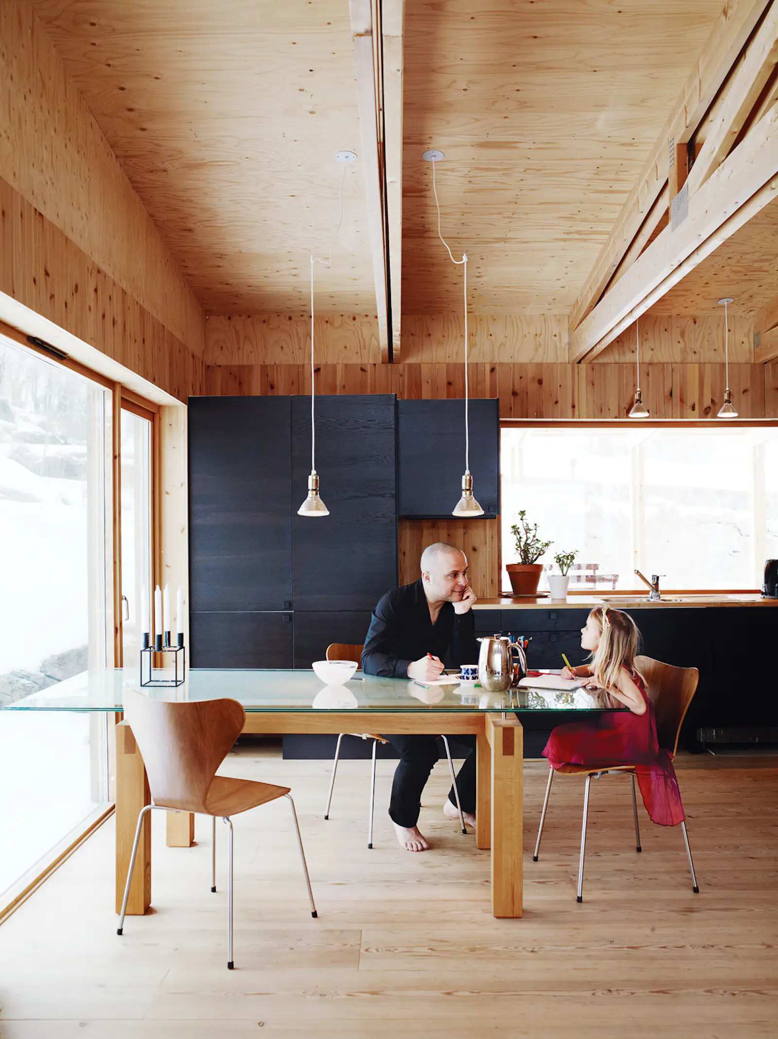 Minimalist Pine-Clad Dining Room in Sweden - Dwell