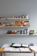 In the upstairs studio Adams draws inspiration from collections of salesmen’s sample cans, Canadian early-20th-century ceramics, and Electrolux vacuum-cleaner piggy banks.  Photo 5 of 8 in From Brown to Green