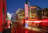 06eOSUf-- ADVANCE FOR ARTS/LIFE-- SIX OF SIX-- The largely completed South Campus Gateway at OSU, a huge mixed-use development at the edge of campus, is aimed at improving the image and livability of the OSU area. The "Alley" at dusk shows the newly opened movie theater in neon glory Thursday, October 27, 2005. (Joshua Gunter/ The Plain Dealer)

PHOTOGRAPHS BY JOSHUA GUNTER  THE PLAIN DEALER  Neon lights are bright at South Campus Gateway, a new $150 million real estate development aimed at revitalizing the battered urban neighborhood at the doorstep of Ohio State University.