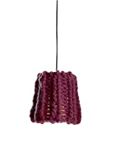 There were actually a handful of yarn lampshades at the fair—the others I saw were from Mut and Ana Krâs at the Salone Satellite—which, as a novice knitter and fan-of-craft, I loved. Granny, a chunky burgundy pendant by Pudelkern Design for Casamania, was inspired by cold winters in the Alps, and made from fire retardant wool.