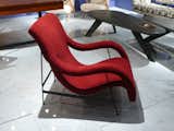 The circa 1950 Arianna chair, by Italian designer Gigi Radice for Renzo Minotti, of bent plywood over steel and covered in a Turkish terry chenille intended to closely resemble the original fabric. From Downtown.