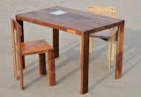 The Safari Kids Table, by Palo Samko, has a black-walnut top and legs and a small leather-covered drawer. It's fully customizable; the chairs shown are black walnut and white oak.