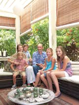 The family—–Wieger, Nicolette, Tammo, Joost, Teuntje, and Pip—–eats most of their meals on the lush, sunlit terrace off the main floor.  Photo 5 of 11 in A Family Moves from Netherlands to Singapore