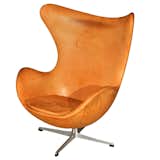 An early-edition Egg Chair, circa 1970, with original leather. By Arne Jacobsen.