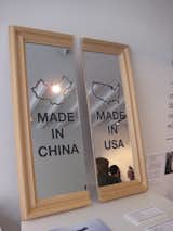 Chi-Merica by Paul Loebach. This mirror represents the divide between American-made products and those produced in China.  Photo 3 of 7 in Uncomfortable Conversations