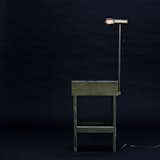 The aptly-named Mesa Alumiada has a carbon filament light bulb attached to a post that sits above the tabletop.