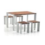 The Deneb table, designed in 1988, has an aluminum frame and teak slats.