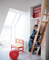 The children enjoy larger bedrooms in the Active House than at their old place. Anna loves the ladder up to her sleeping deck. The furniture is by the Danish firm We:Do:Wood. The interior Douglas fir is from Dinesen.
