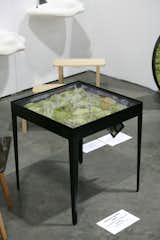 A trio of Real Moss Garden Tables by Pawinee Santisiri of Ayodhya enlivens the Thai booth of Asia Now. A handsome and verdant addition to any space.