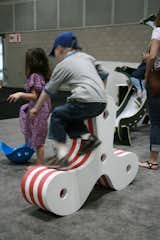 Turkish-born Rana Ottaviani, who lives in Seattle with her Italian husband and two young children, designed the Tatolino (Italian slang for “little potato”) of EVA foam for kids age one to 12 and beyond. Child after child in the Modern Family Zone pounced, sat, bounced and rode upon the versatile, three-pronged forgiving form. When flat, it can serve as a seat, table or the ultimate item for pre-walkers to pull up on; turned on its side it becomes a comfy, high-backed chair or striped horsey. Made for RO2 Design Studio in Seattle.  Photo 1 of 8 in The Modern Family Zone by Erika Heet