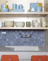 The Ferry Building shop displays seasonal goods as well as items from some of Heath’s most popular collections. The backsplash is Heath dual glaze tile in tones of blue that creates a dynamic pattern and hints at the water that collects in the sink.
