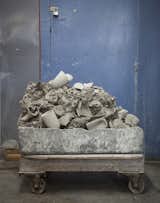 A cart full of recycled clay.  Search “ceasarstone-recycled.html” from Factory Direct