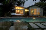 Chinmaya + Apurva: Collaborative extended a house in Studio City, California for Edgar Lyall and Elizabeth Wise, by introducing a two-part structure they conceived as a lantern, at left (the new dining area off the expanded kitchen), and a barn, at right, housing a master bedroom and bathroom.  Photo 1 of 9 in The Barn and the Lantern