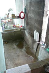 I also enjoy the look of this poured-in-place concrete bathtub, though it looks somewhat rough on the back.