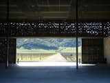 Upon entering the winery, visitors are met with a minimalist hall and an unobstructed route through the structure.