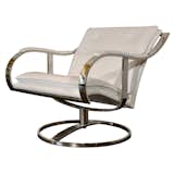 Warren Platner Lounge Chair

U.S.A., late 1970s

"Designed by Warren Platner for Steelcase, this swivel lounge chair is as luxurious as it is substantial. There were a few versions of this basic design produced: this is the rarely seen and very rakish "low and wide" model. Heavily made of polished solid stainless steel, with brand new leather upholstery. Super comfortable."