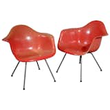 Very Early Charles Eames "LAX" Lounge Chairs

U.S.A., 1950

"These Eames fibreglass lounge chairs are from the very first year of production, 1950. They are distinguished by their hand-made "rope-edge" Zenith shells and early lounge-height x-bases. These are museum-quality examples of one of the most important chair designs of the last century. 

Each chair retains its original, early 1950s vintage "Charles Eames / Zenith Plastics Co. / Herman Miller" label."