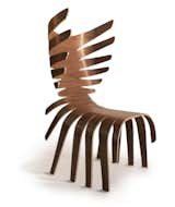 The Cervo chair is meant to mimic the antlers of a deer, though it also has a distinctly ribcage feel to it. Or perhaps it evokes a centipede. In any case, it's a bit of design clearly taking its cues from the repetitions found in nature. It's made of formed plywood. Photo courtesy of Industry Gallery.