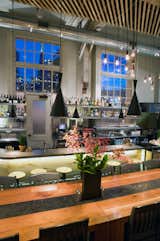 Smith designed and had custom-built all the tables and chairs in the mostly vegetarian, local- and organic-focused restaurant, whose fare includes (and we sampled) thin pizzas and beet burgers. "They reflect what the cafe and its food is all about," he says. Photo by Kelly Barrie.