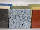 Also displaying recycled-glass surfaces was IceStone. The blue color in its line comes from recycled Skyy Vodka bottles.
