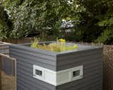 The coop is topped with a green roof composed of native Oregon sedums.