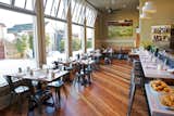 The design was a collaboration between Bleskacek, Siu, architect Darren McMurtrie, and the couple's contractors. "We took a really leap-and-the-net-will-appear approach," Bleskacek says. "We had a vision based on the existing interior of a lot of wood and also hints of metal." Along the restaurant's 18th Street facade, light pours in through the windows connecting Plow diners with passersby. "It's a neighborhood-centered restaurant," Bleskacek says.