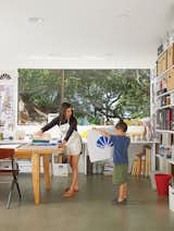 Office, Craft Room, and Concrete Verda Alexander and her son, Apolo, collaborate on a project in their first-floor studio.  Office Concrete Craft Room Photos from Undivided Intentions