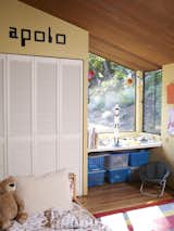 Apolo's bedroom is unmistakably that of a young boy, as the old-school computer font and clear debt to NASA suggest.