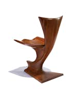 Studio craftsman Michael Coffey, who was a contemporary of artists Wharton Esherick, George Nakashima and Wendell Castle, designed the Viking chair in 1970. In addition to designing furniture (often in the basement of his Staten Island home), from 1953 to 1972 Coffey worked as a community organizer helping low-income groups fight for basic needs. He designs today for Todd Merrill Antiques. Estimate: $6,000–$8,000. Photo courtesy of Los Angeles Modern Auctions.