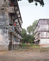 These buildings and the Institute were built on land “appropriated” by the government from Wat Sok Pa Luang (Forest Temple). This used to be a forest area outside Vientiane and is now very much part of the city.