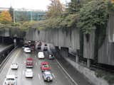 The reason the art under the viaduct compelled me so was that ramps over the I-5 highway make for what I consider some of the most beautiful underpasses to drive. The greenery that clings to the concrete bridges above stumbles over from Freeway Park.