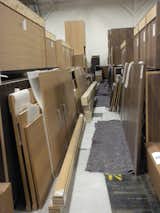 After three more steps, the cabinets end up in their final "cell," where they are assembled and packaged for shipping and installation.