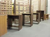 The factory is also home to the company's testing area. Shown here are prototypes for and the final designs of Henrybuilt's new stools.