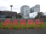 After crossing the bridge, I arrived on the Meadows, a section of the park planted with native grasses and flowers. Though it is here that Alexander Calder's Eagle proudly stands, the bright-red chairs set along the path is what caught my eye the most—especially those placed looking out toward the Puget Sound and with their backs to the aged-yet-still-iconic Space Needle.