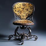 Centripetal Chair designed in 1849. Made of cast iron, lacquered wood, and upholstery. Attributed to the American Chair Company in Troy, New York.