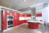 The fire-engine-red Flux kitchen unabashedly uses color to draw people into the store. Though this design has been around for a couple of years, it was still one of the most attractive and eye-catching areas in the showroom.