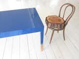 Khemsurov: "The blue table is a precursor to Trift, developed in 2008 for Milan's Post Design Gallery. The chair, however, is a kind of inside joke — Seng acquired the broken Thonet frame from her grandmother's house eight years ago, and Valder kept begging her to fix it or throw it out. The feud was resolved during the move in May, when someone rested one of Seng's stumps on the chair's seat by happenstance. "Now we love it," says Valder."
