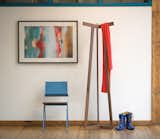 Here's their handsome Stretch coat rack, next to the metal-and-walnut Lockwood chair.
