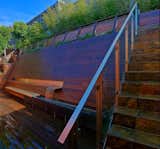 For a steeply sloping backyard in San Francisco, he devised this all-in-one wooden wall, which provides seating, a fountain that helps block out highway noise, and, at the top of the steps, a lookout point that offers a view on the surrounding neighborhood.