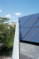 A 260-square-foot solar array was installed atop a triangular section of the roof, which faces due south and is angled at 30 degrees for optimal solar collection.