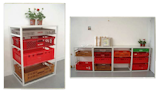 The All for One shelf is made of a white frame housing the colorful plastic trays used by bakers for transporting bread.
