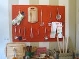 Wageman takes a cue from Julia Child with her cheerful pegboard organizer.  Photo 4 of 9 in Pot + Pantry