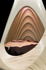 The light catches the wooden ridges and makes the interior appear to glow.