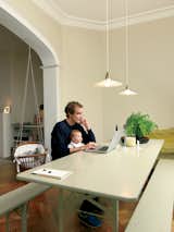 Dining Room, Table, Bench, Pendant Lighting, and Dark Hardwood Floor Designer Christiane Hogner, Bruxelles  Search “divis-dining-table.html” from Kind of New