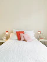 Bedroom, Bed, and Table Lighting The orange his-and-hers lamps in the bedroom came from Högner's sister's childhood bedroom. "My sister prefers new things," said Högner. "But my dad can't throw anything out.  Search “citrange orange squeezer” from Kind of New