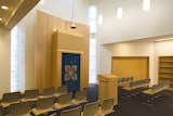 The main interior space serves as an education center and is where worship services are held.  Search “Continuing-Education.html” from Modernism for an Ancient Pastime