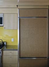A fridge clad in cork provides a decidedly warm touch to the kitchen.  Search “kitchenappliances--refrigerator” from Family Home Renovation in Brooklyn