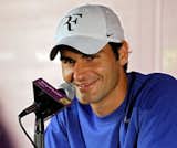 There's that logo on Fed's cap.  Photo 1 of 3 in Roger Federer's Personal Logo?