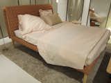 The fabulous new Ruché bed by Inga Sempe, which can be made in almost any fabric and was exhibited in an orangey mauve. "A beautiful bed, and a feminine one," said Roset.